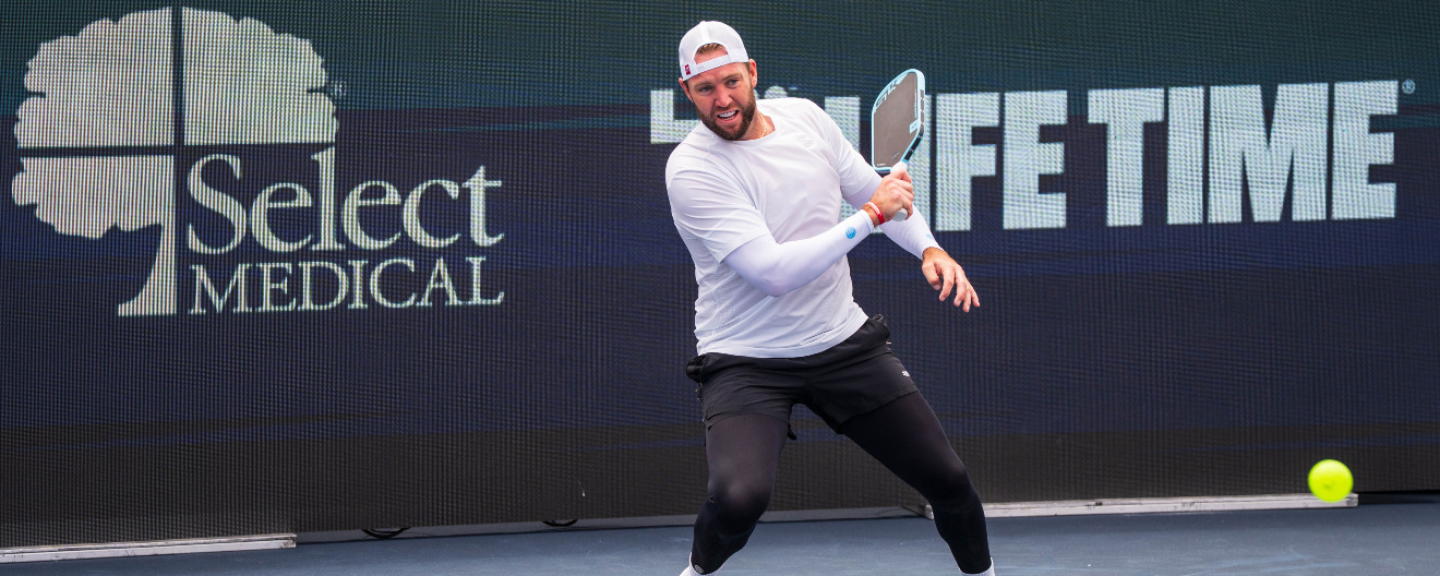 Jack Sock hitting a pickleball forehand.