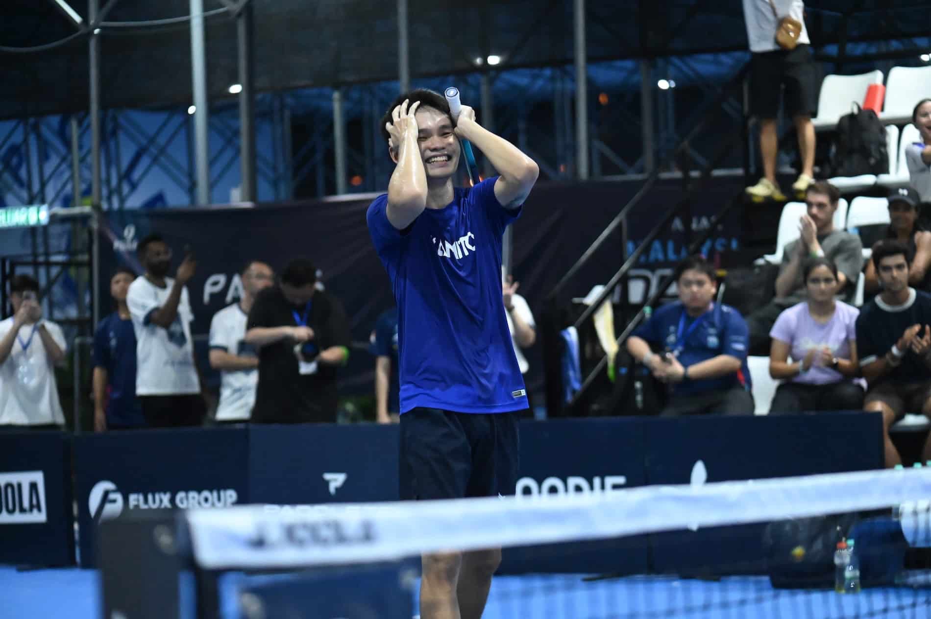 Giang Trinh celebrating his men’s singles win.