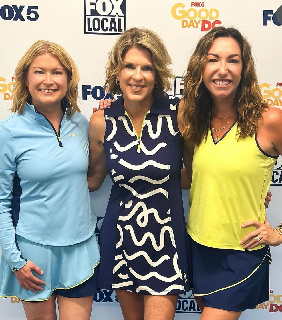 Three women in vibrant fun clothing