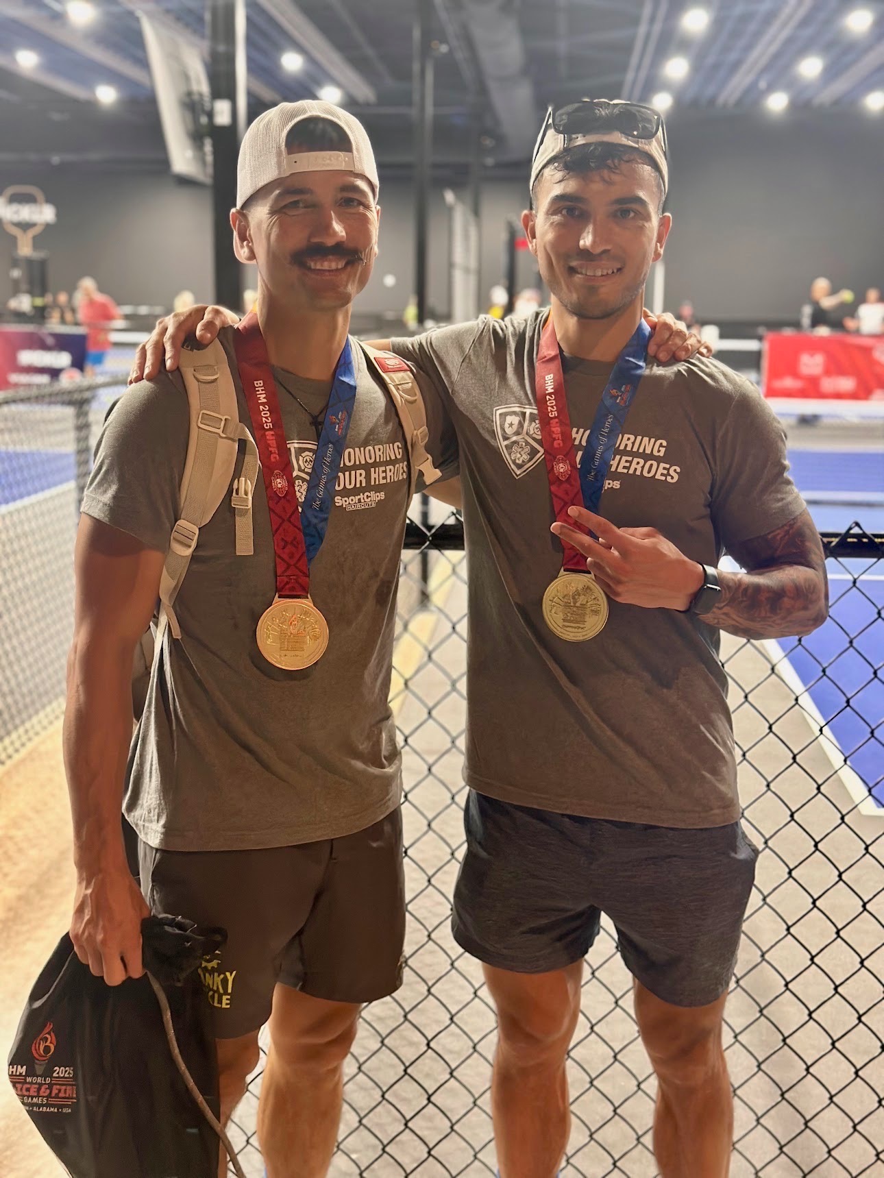 Martin and Chris celebrating their gold medal together.