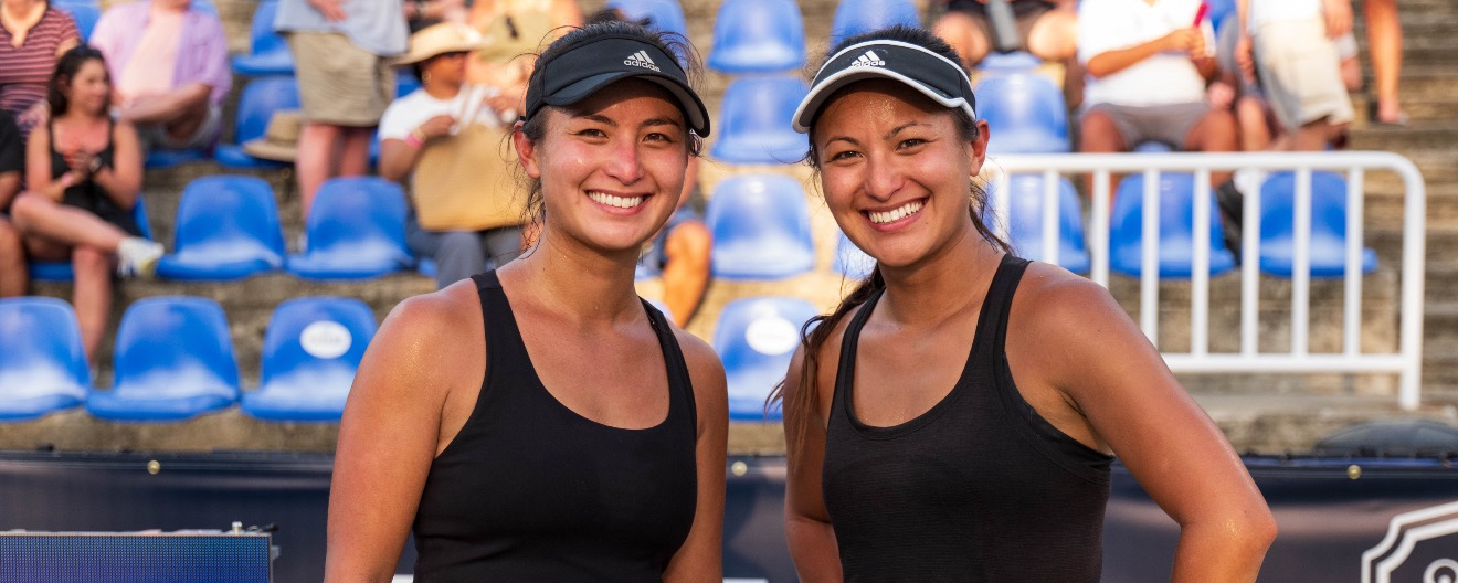 Jade and Jackie Kawamoto smiling on the court.