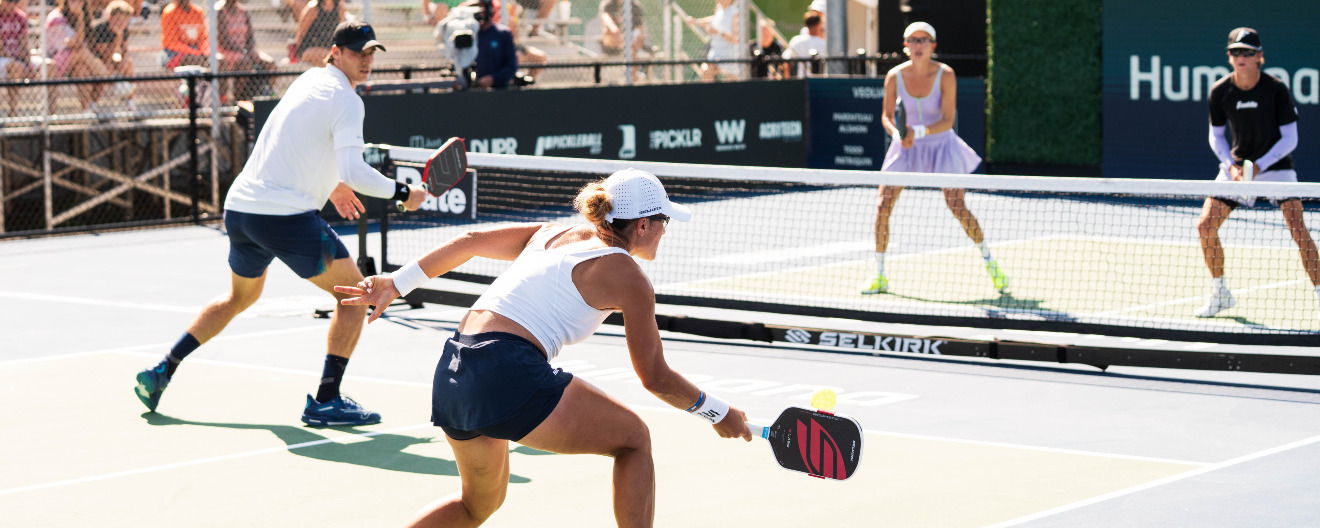 Catherine Parenteau and Christian Alshon competing in mixed doubles at the Veolia Bristol Open.