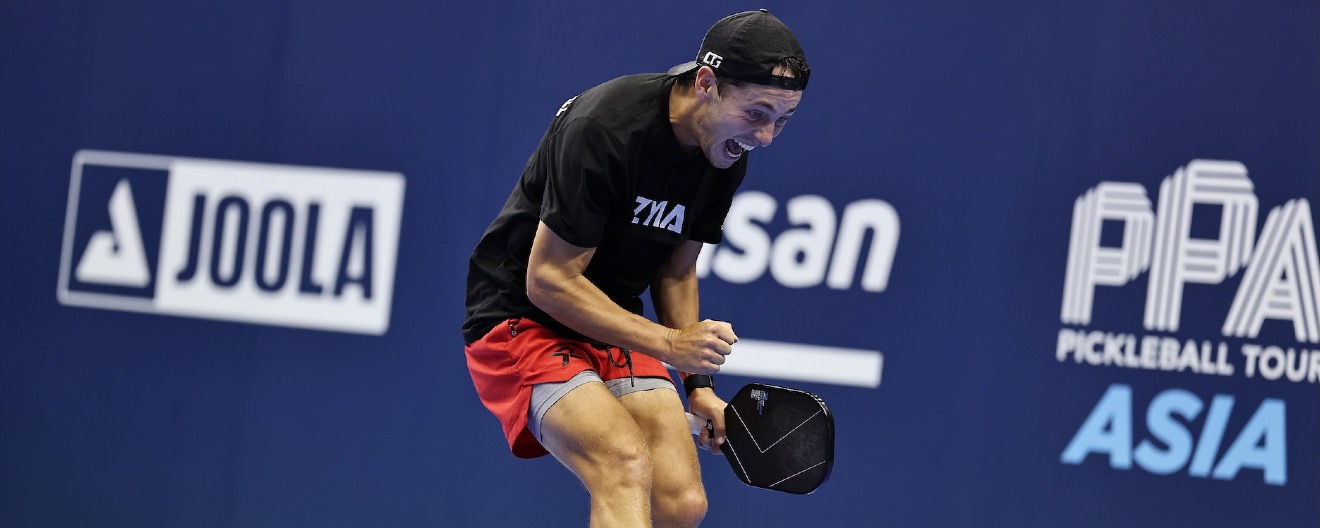 Connor Garnett celebrating on the court.