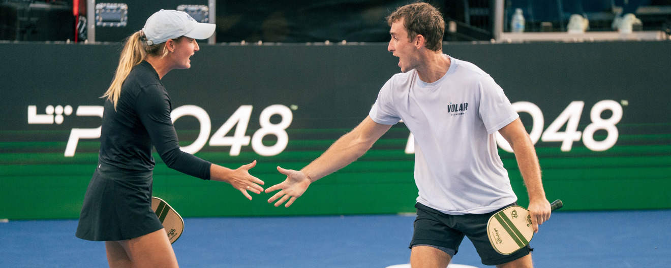 Kate Fahey and Dylan Frazier celebrating their victory at the Pickleball Central Sacramento Vintage Open.