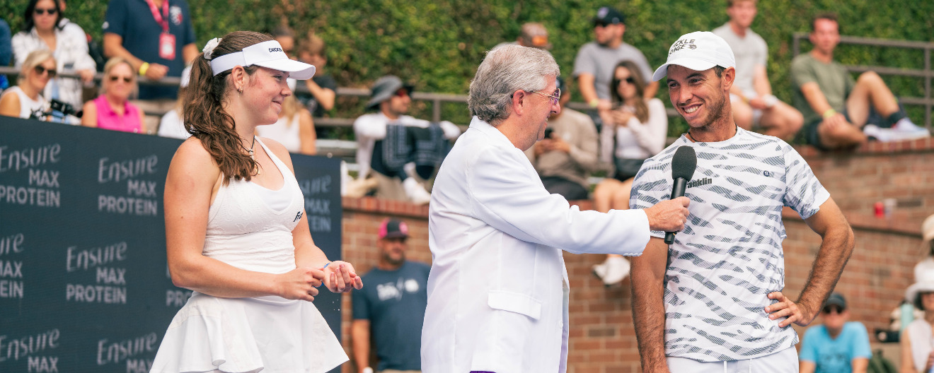 Jorja Johnson and JW Johnson being interviewed by Dave Fleming after winning the mixed doubles title at the Pickleball Central Sacramento Vintage Open.