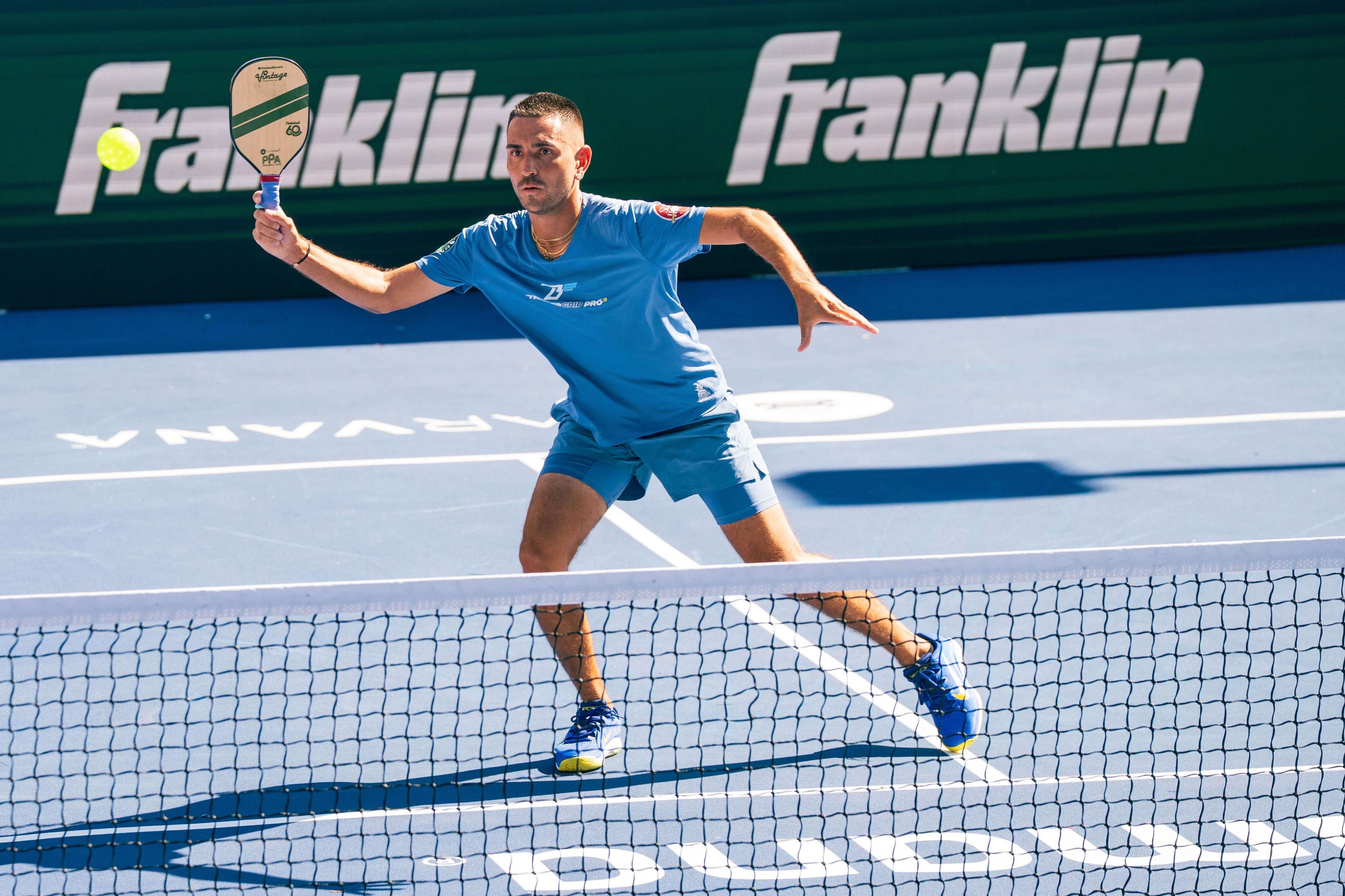 Joseph in a blue outfit