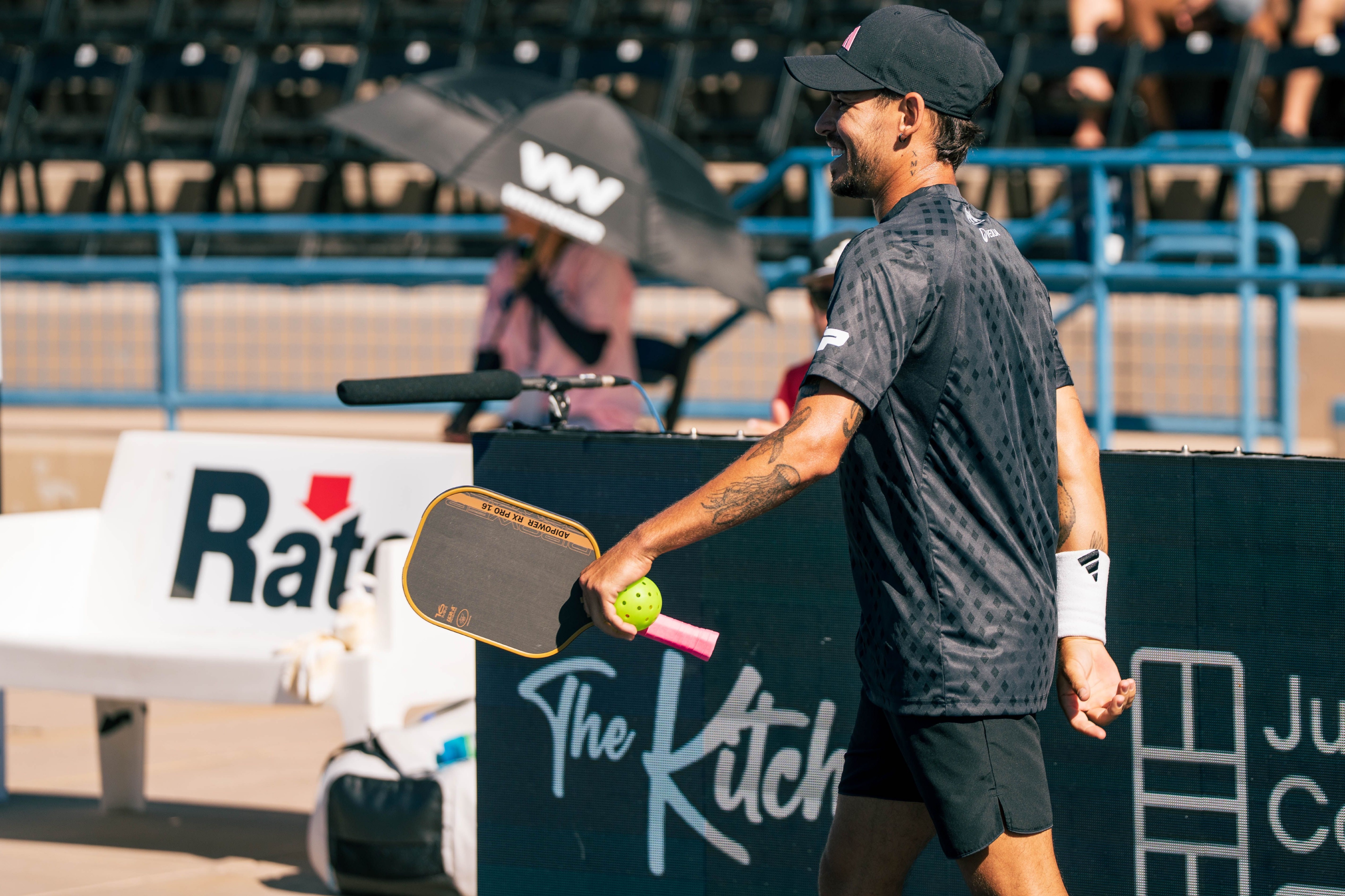 Martinez Vich in a textured t-shirt and black shorts