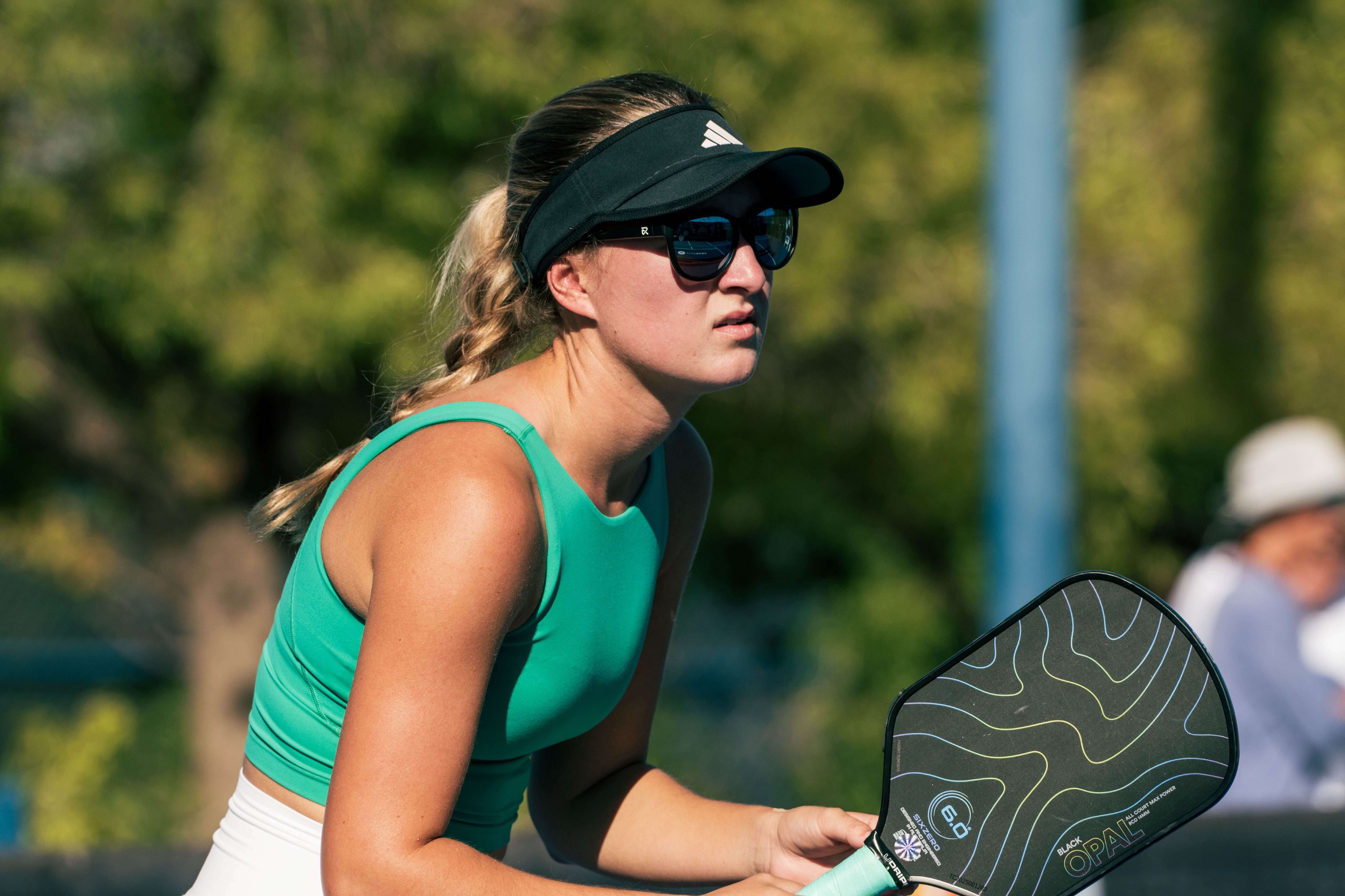 Brascia in black sunglasses playing pro pickleball