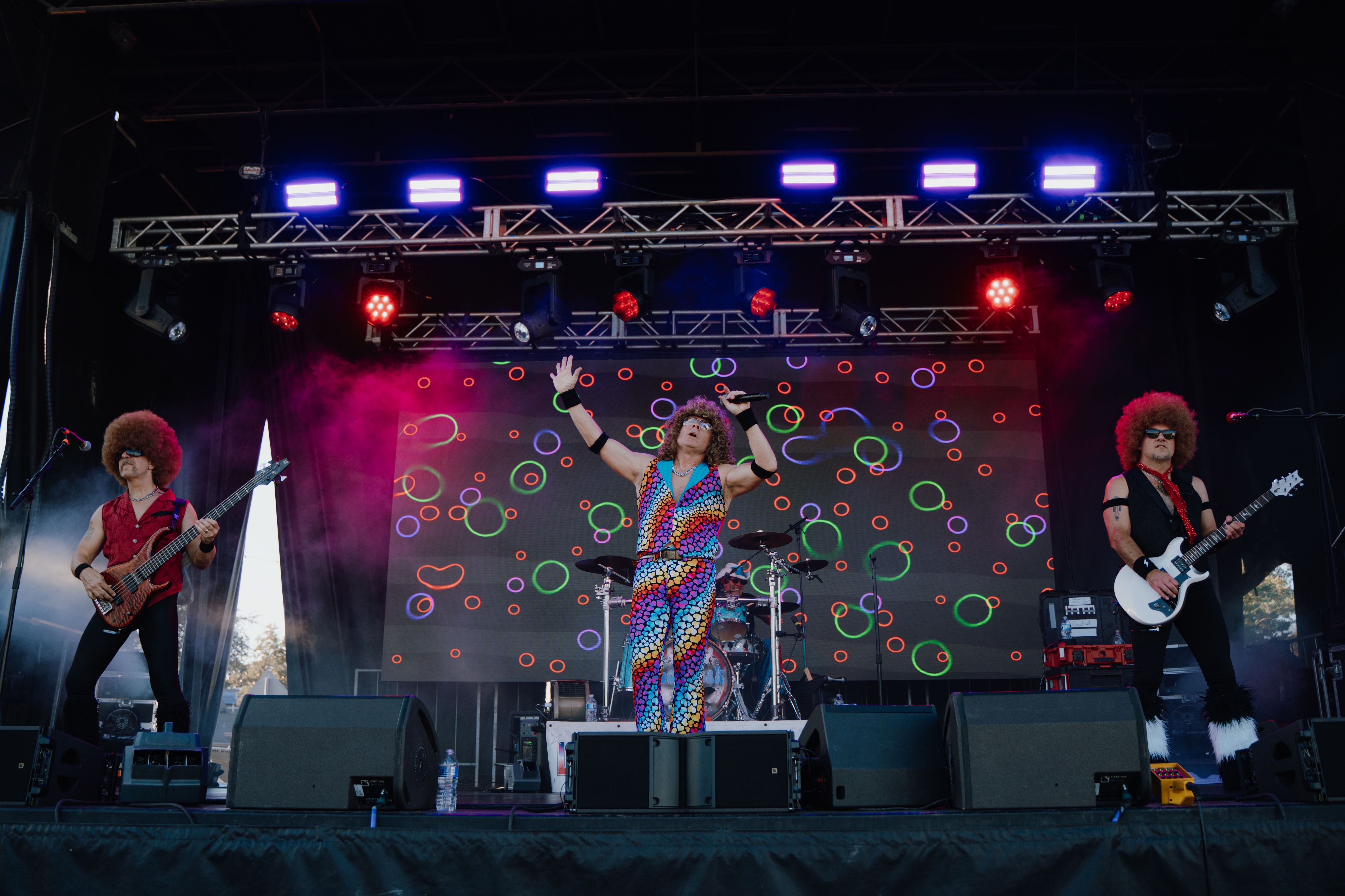 La Freak in tie-dye bellbottom outfits