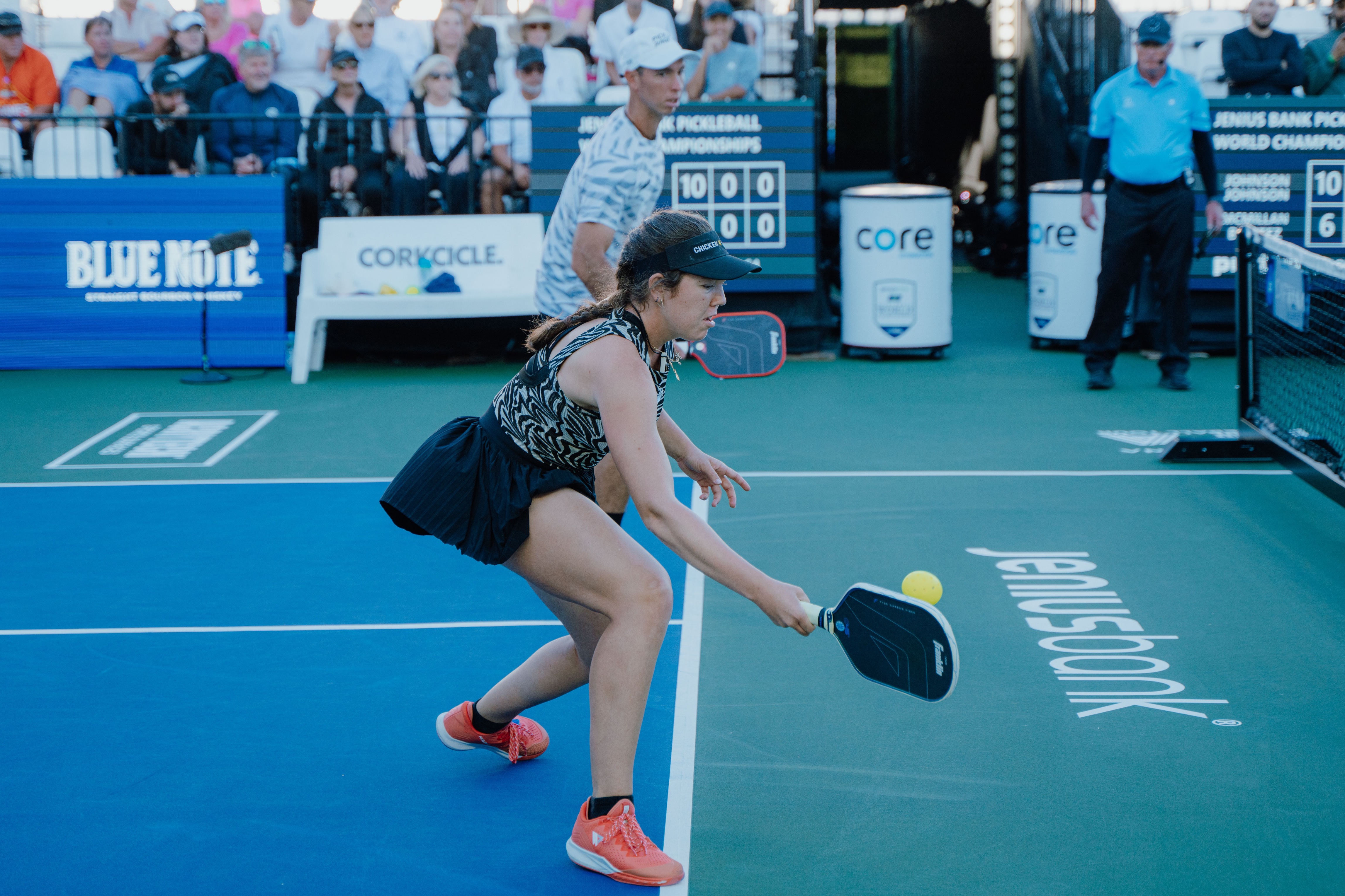 Jorja in a zebra print top and black skirt