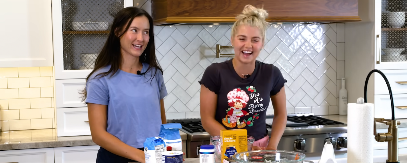 Anna Bright and Anna Leigh Waters standing in a kitchen baking.