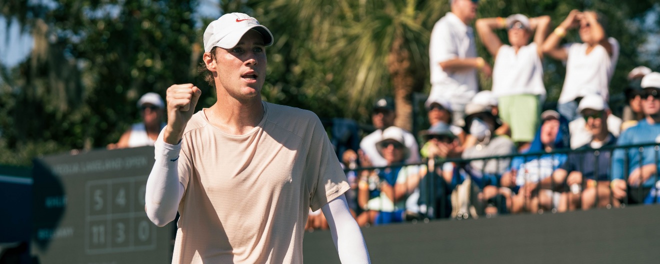 Roscoe Bellamy fist pumping on the pro pickleball court.