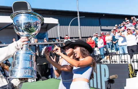 Anna Bright and Anna Leigh Waters taking a selfie with the trophy at the Jenius Bank Pickleball World Championships.