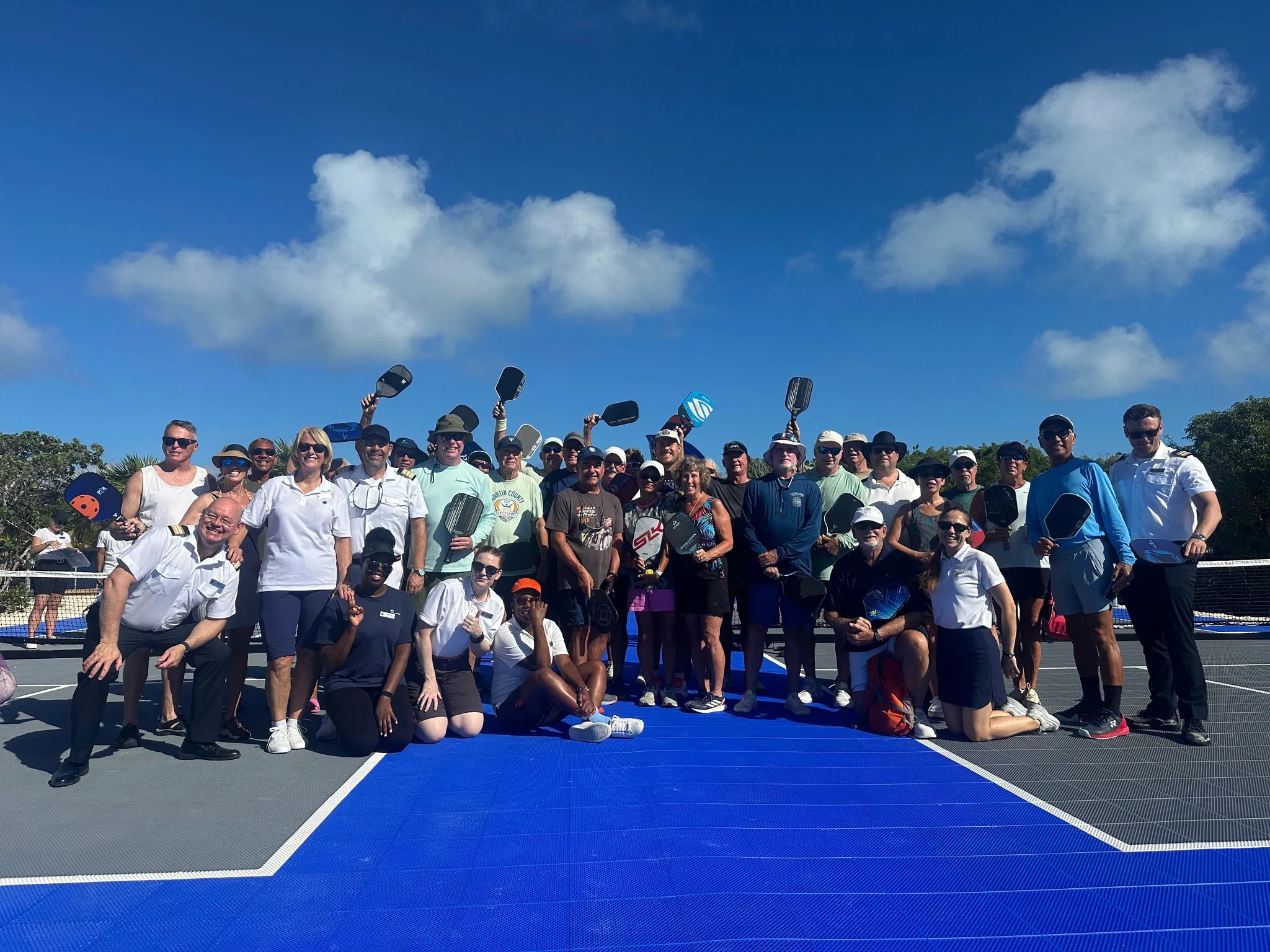 Guests and crew enjoying their pickleball experience.